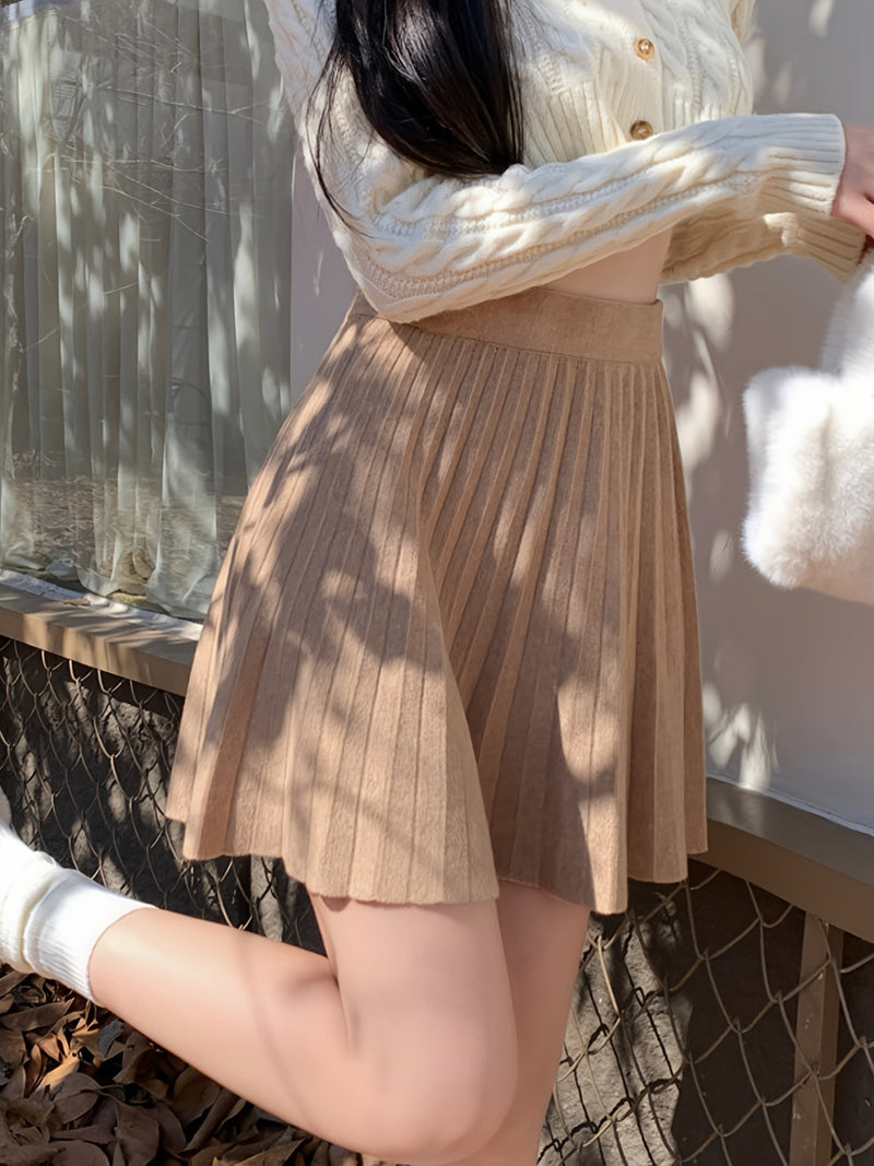 Cute And Playful High-Waisted Pleated Solid Color Mini Skirt.