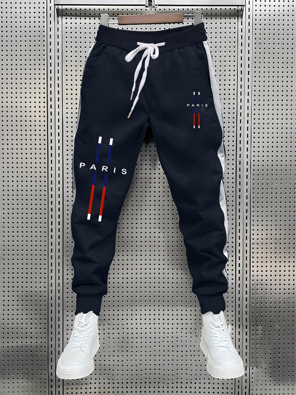 fashionable Men's color blocked drawstring sports pants.