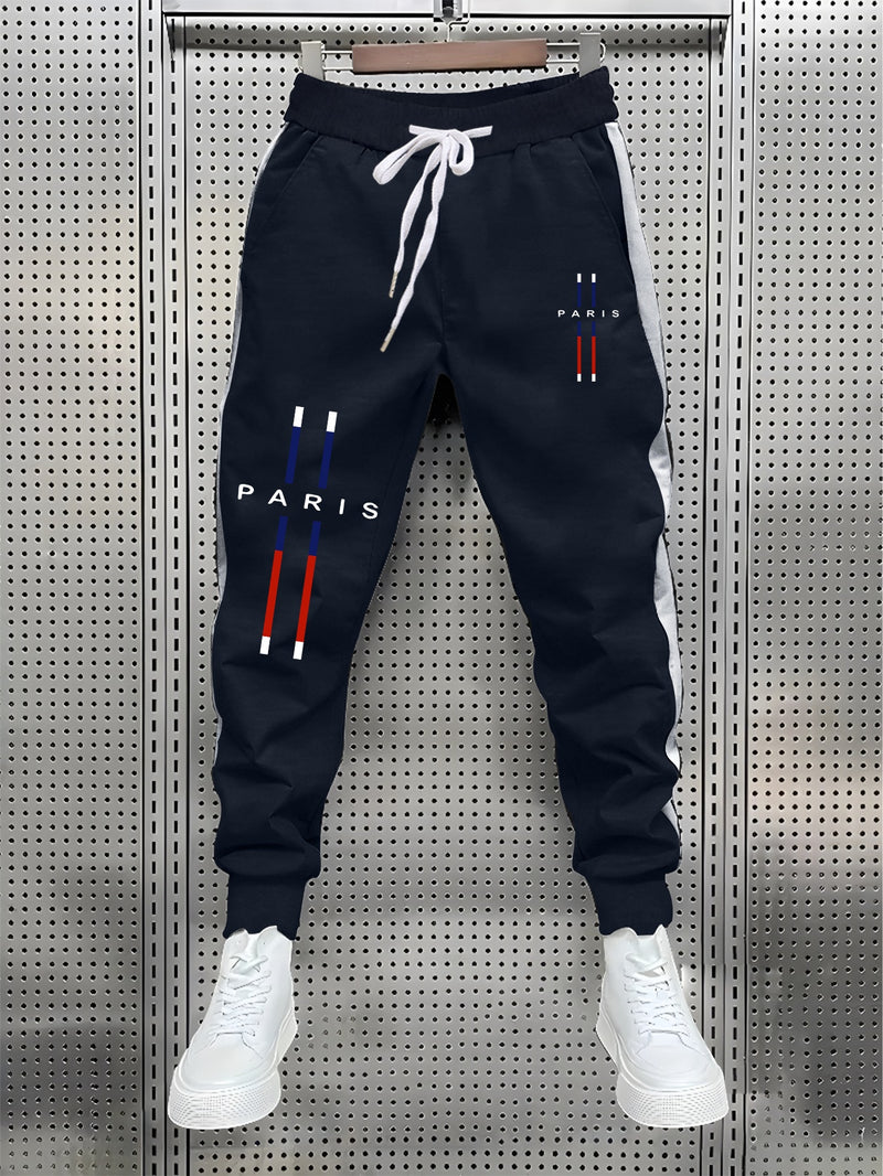 fashionable Men's color blocked drawstring sports pants.