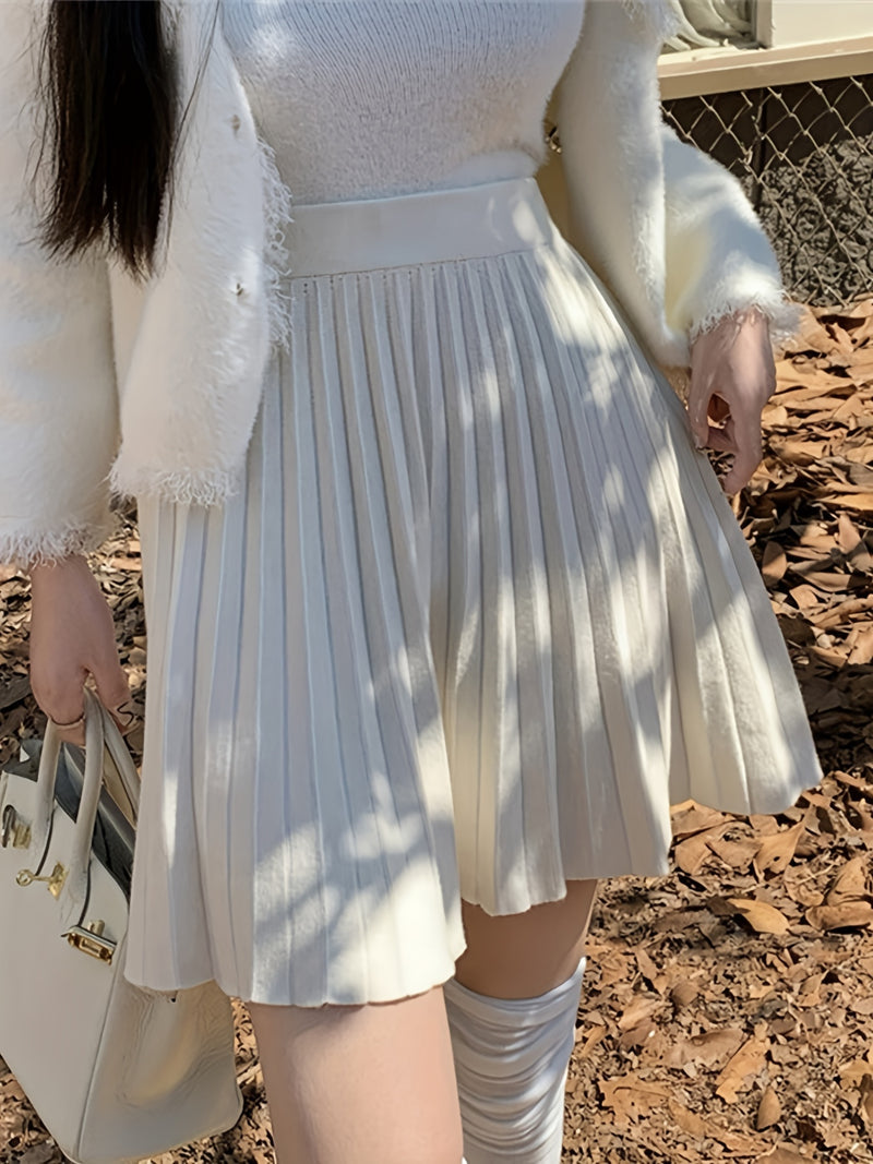Cute And Playful High-Waisted Pleated Solid Color Mini Skirt.
