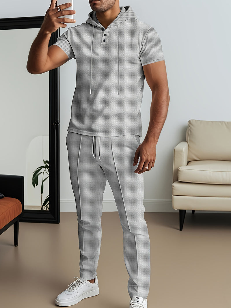 Men's set short sleeved hooded top with drawstring elastic waistband.