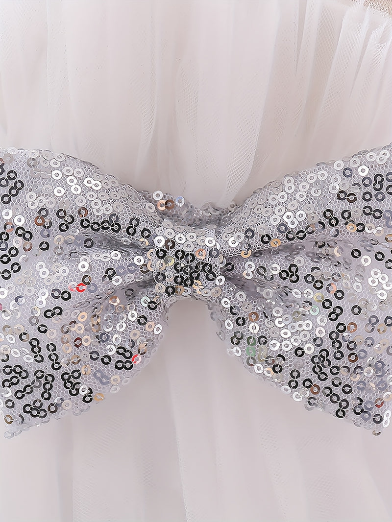 The Girl's Ethereal Puffy Dress, Perfect for a Baby's Birthday Party.